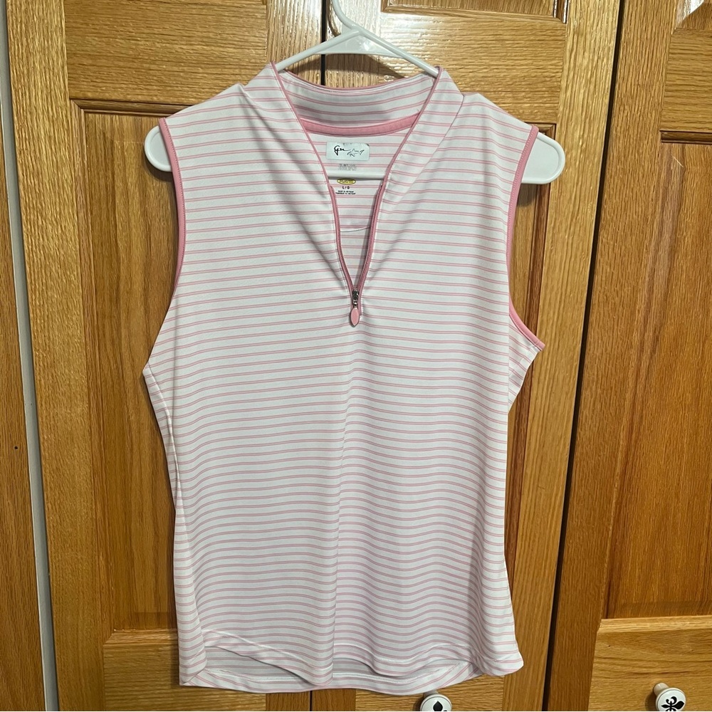 Greg Norman women’s golf shirt. White w/pink stripe. Size Lg Stand zip c…